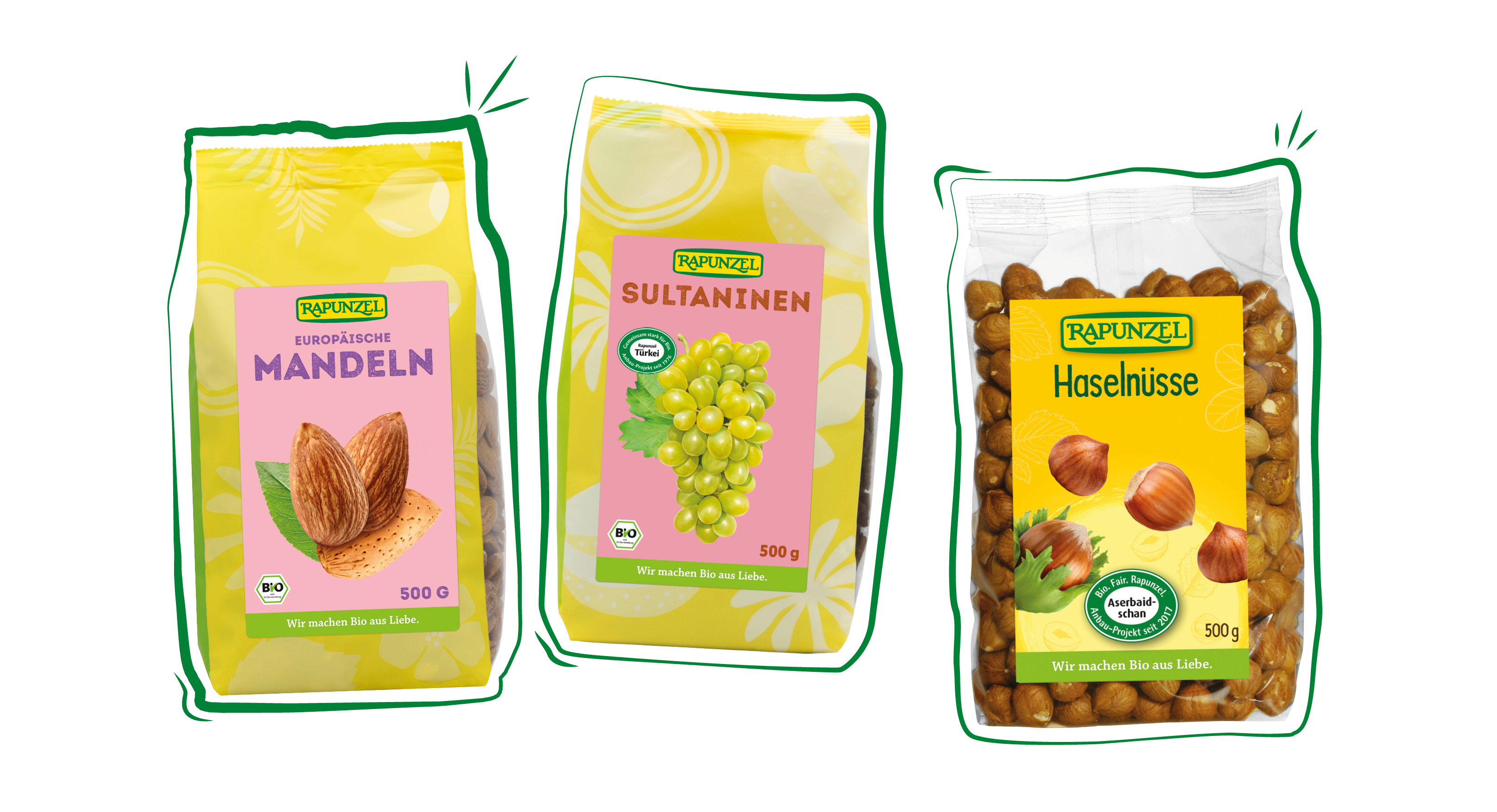 Verschiedene Packungen Trockenfrüchte und Nüsse von Rapunzel nebeneinander