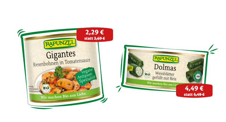 Rapunzel Gigantes Riesenbohnen in Tomatensauce und gefüllte Weinblätter (Dolmas) nebeneinander arrangiert – zwei mediterrane Feinkostklassiker in Bio-Qualität zum Vorteilspreis