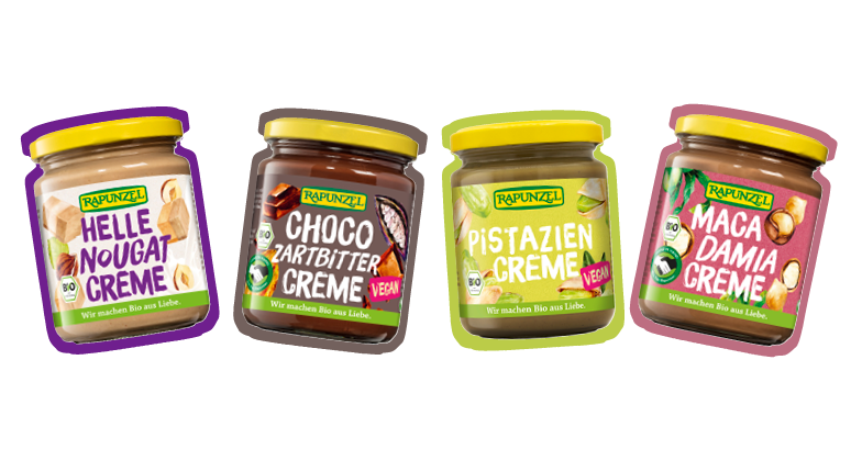 Fünf verschiedene Nusscremes von Rapunzel nebeneinander