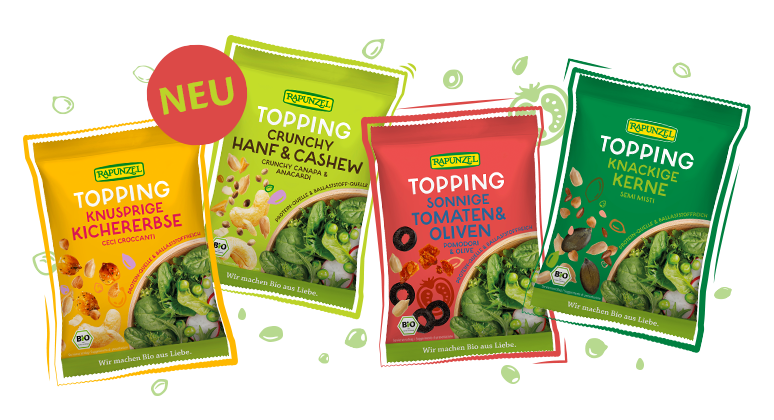 Banner mit vier abwechslungsreichen Salat-Toppings – ideal zum Verfeinern: von knusprig gerösteten Kichererbsen über mediterrane Tomaten-Oliven-Mischung bis hin zu nussigem Knusper-Hanf und knackigen Kernen