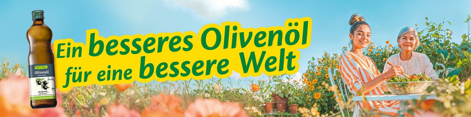 Werbetext 'Ein besseres Olivenöl für eine bessere Welt' mit zwei lächelnden Frauen, die Salat umrühren